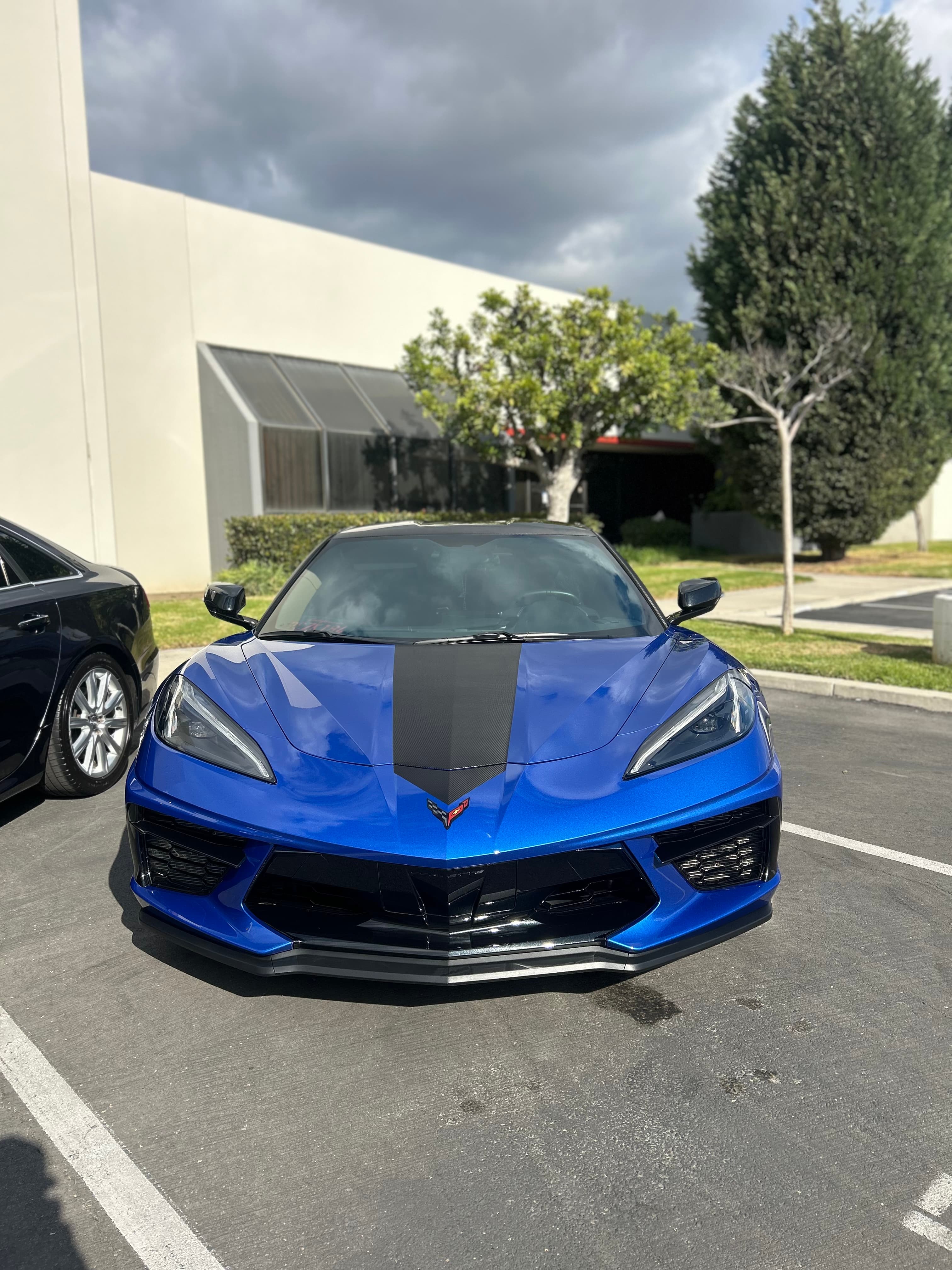 Blue C8 Corvette — flawless front view after coating