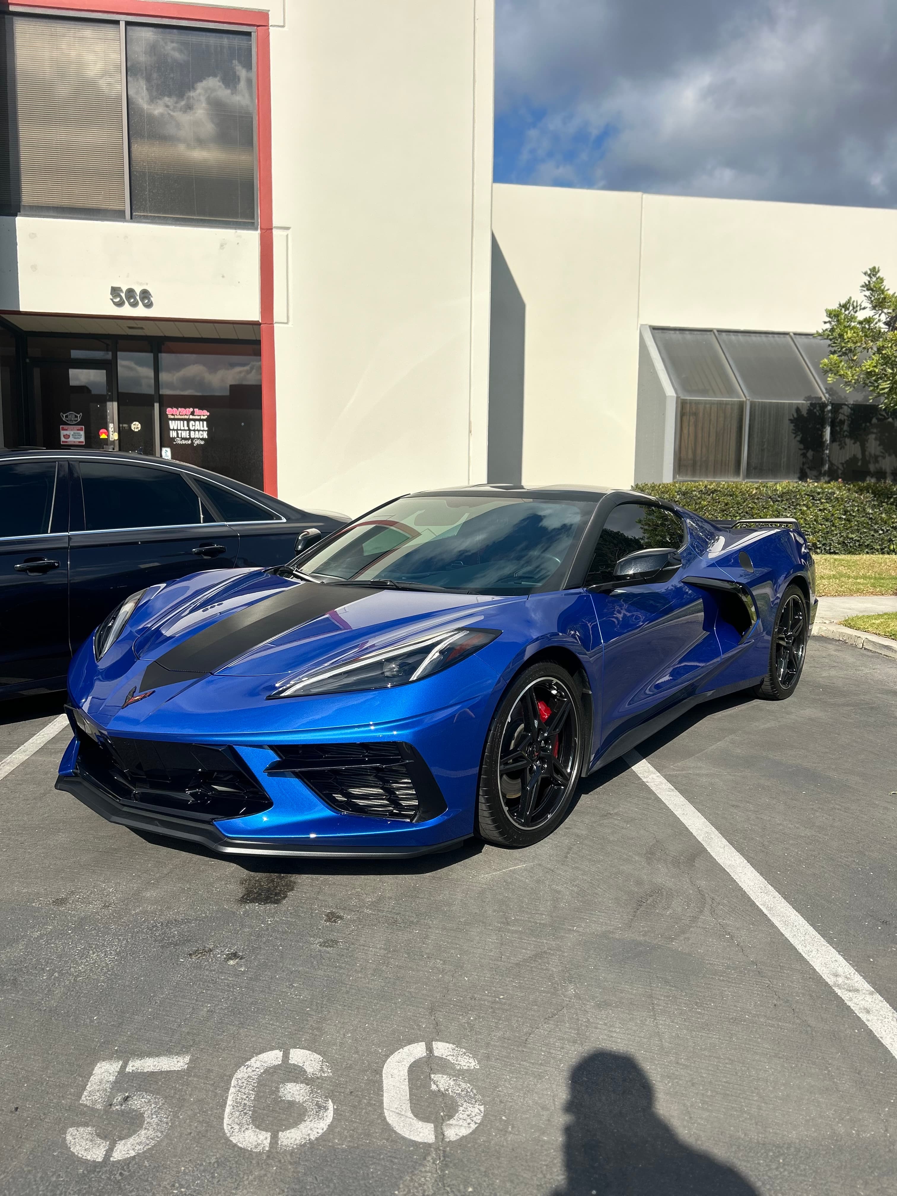 Blue C8 Corvette — side profile with full body protection